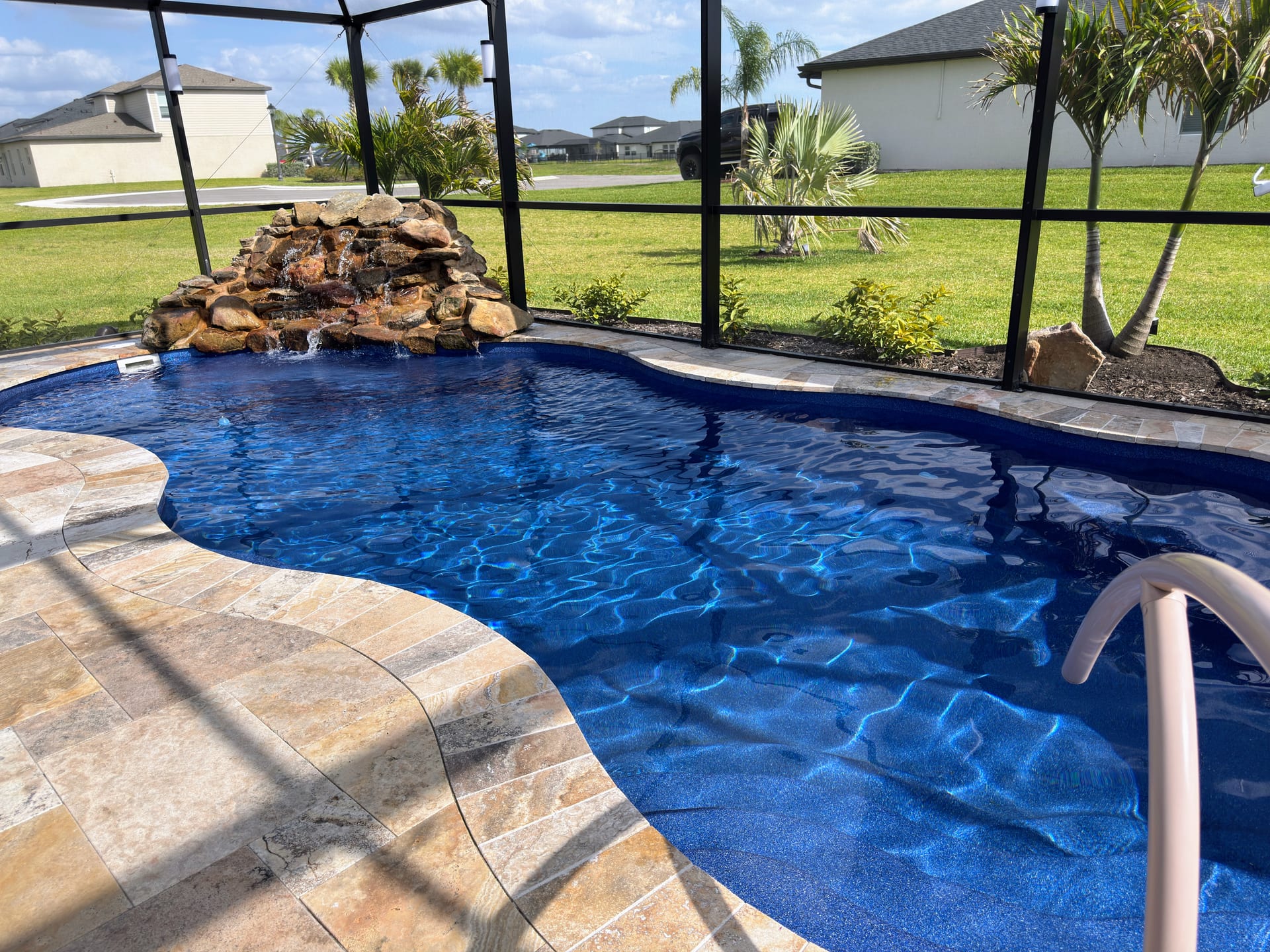 Clean screen enclosure over a pool