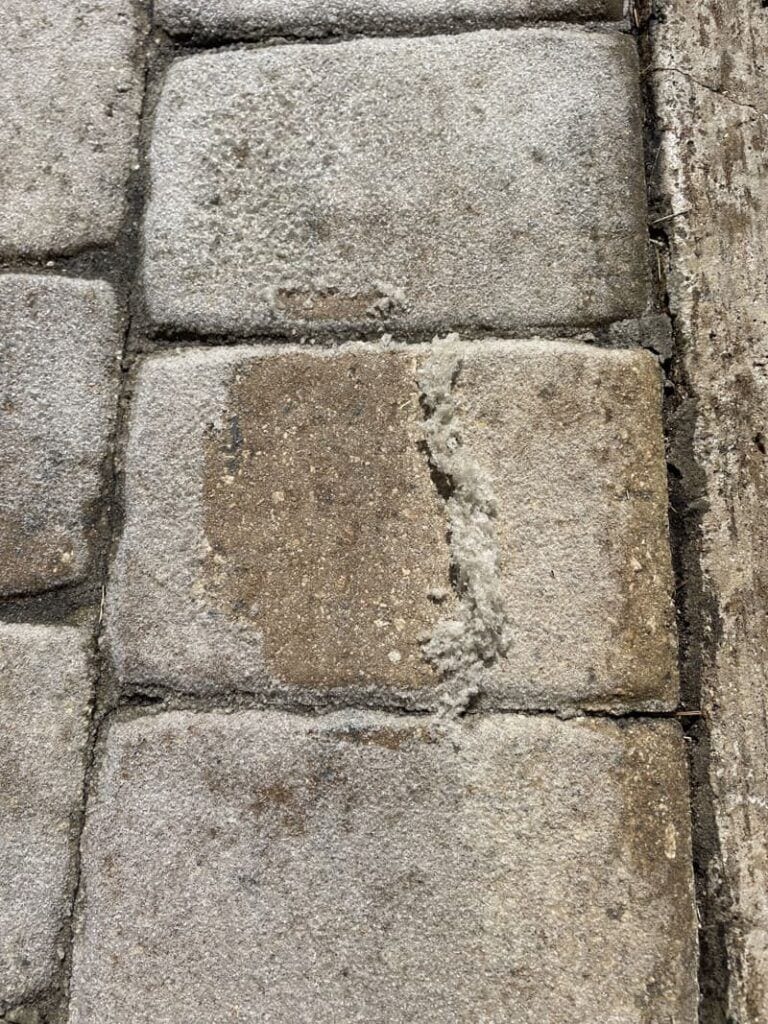 Stripping failing old sealer from pavers