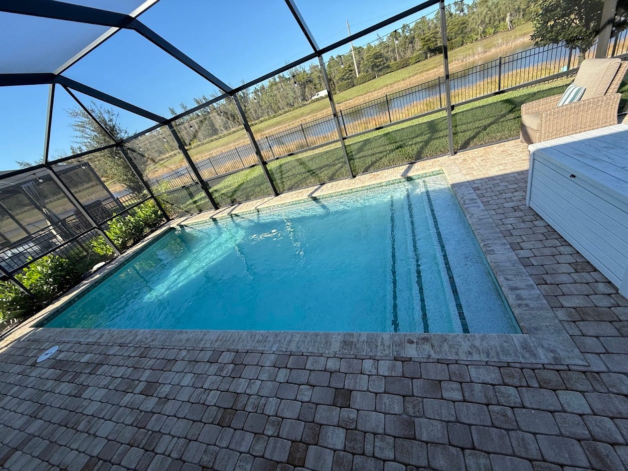 Pristine pool deck and clear water