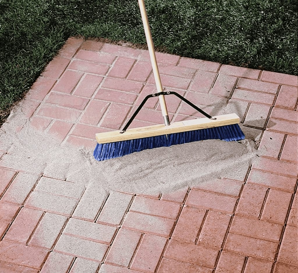 Fresh joint sand swept in and pavers resealed