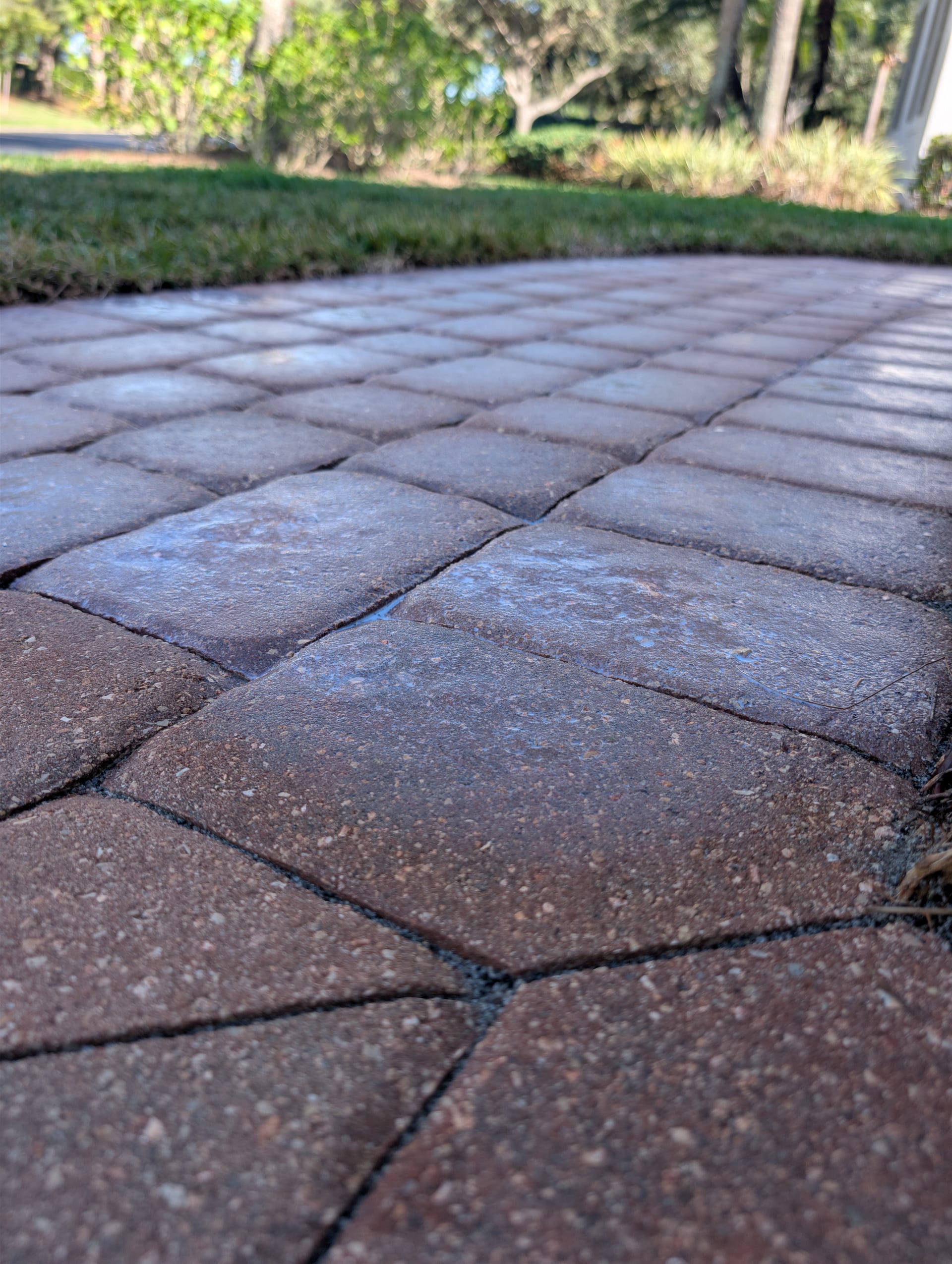 Sealer coat being applied to pavers